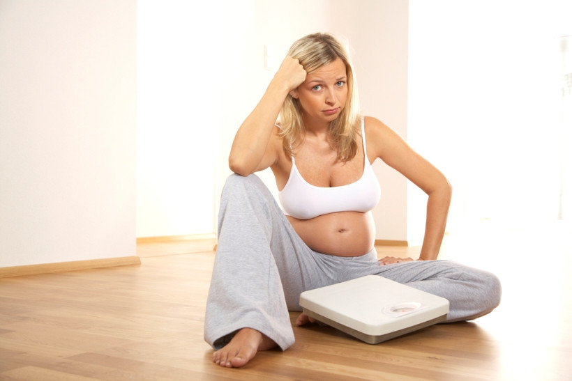 беременная и весы