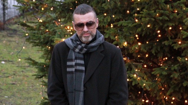 Певец Джордж Майкл