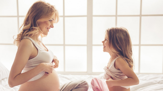 беременная с ребенком